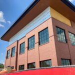 new soffit and siding being added to a Commercial brick building in Omaha, NE