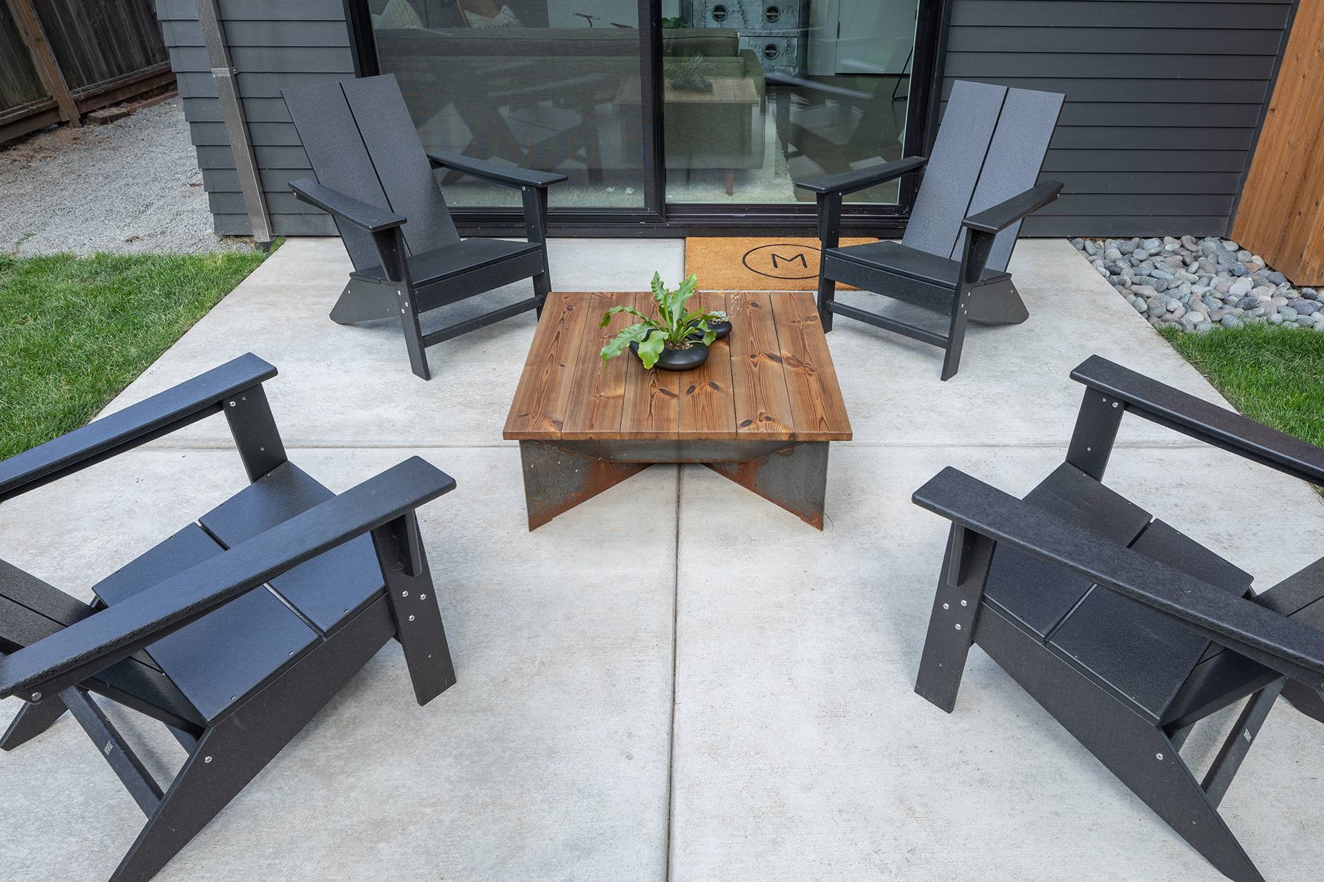 closeup of a concrete patio on the back of a house